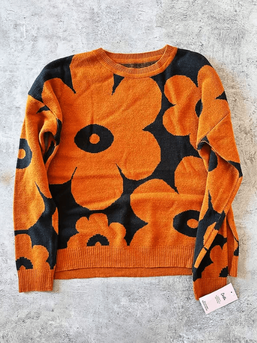 Sweater naranja con estampado floral retro de mujer